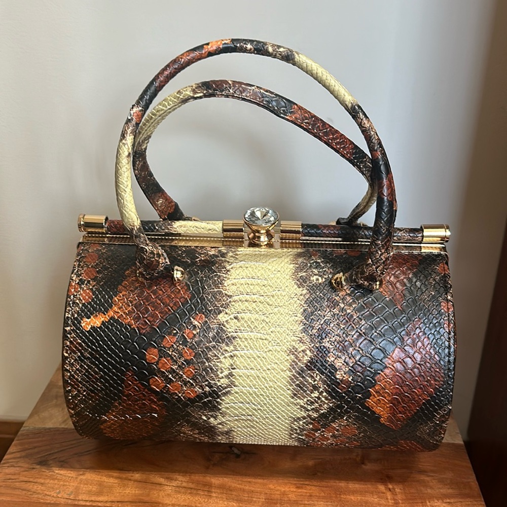 NWT barrel shaped top handle bag with matching print/chain shoulder strap.